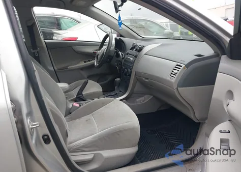 2009 Toyota Corolla Le from USA, damaged, VIN JTDBL40E99J014182